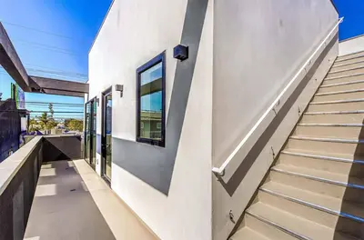 a staircase leading up to a building with a window at Cozy Luxerius 1 bed Loft Venice in Los Angeles