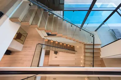 a staircase in a building with a glass ceiling at Swallow Sanctuary in Los Angeles