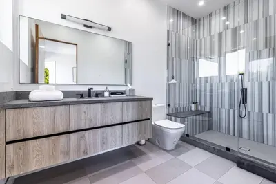 a bathroom with a sink and a shower and a toilet at The Penmar Retreat - Luxurious resort-style oasis in Los Angeles