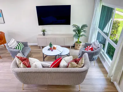 a living room with a couch and a tv at Sweet 2 bd for monthly stay! 20 mi to Disney in Diamond Bar
