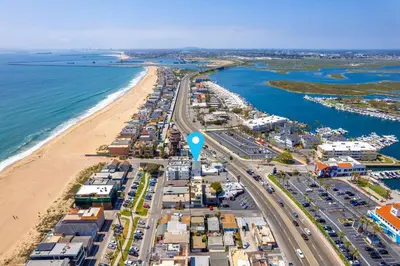 an aerial view of a beach next to the ocean at 130 Anderson St B in Sunset Beach