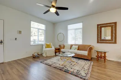 a living room with a couch and a table at Charming Oak View Retreat about 5 Mi to Ojai Valley! in Oak View