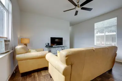a living room with a couch and a ceiling fan at Oak View Vacation Rental about 3 Mi to Lake Casitas! in Oak View