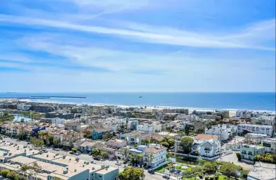 an aerial view of a city and the ocean at Sunny Condo with Panoramic Ocean Views in Los Angeles