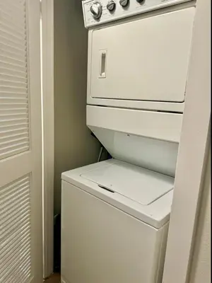 a small white refrigerator in a small kitchen at Hollywood Sign View 2 Bed 2 Bath Premium Corner in Los Angeles