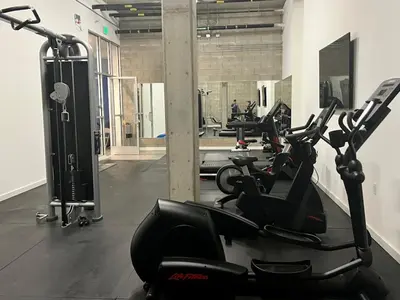 a gym with a row of exercise bikes in a room at Hollywood Sign View 2 Bed 2 Bath Premium Corner in Los Angeles