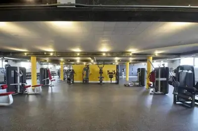 a gym with lots of equipment in a room at Blue Agate - Seaside Bright 2BR with Marina Views in Los Angeles