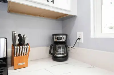 a coffee maker sitting on a counter in a kitchen at Lovely 3bedroom condo with free parking on premise in Los Angeles