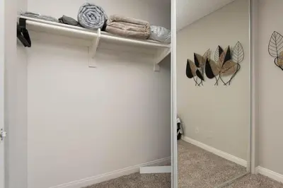 a room with a closet with towels and feathers at Hollywood 2Bed Apt w Rooftop pool & Panoramic View in Los Angeles