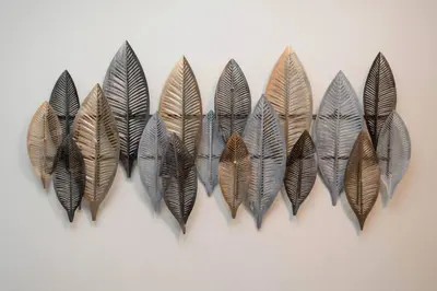 a group of feathers hanging on a wall at Hollywood 2Bed Apt w Rooftop pool & Panoramic View in Los Angeles