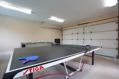a ping pong table in a garage at Destination #06 in Anaheim