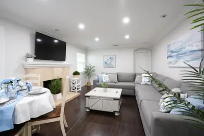 a living room with a couch and a fireplace at Destination #02 in Anaheim