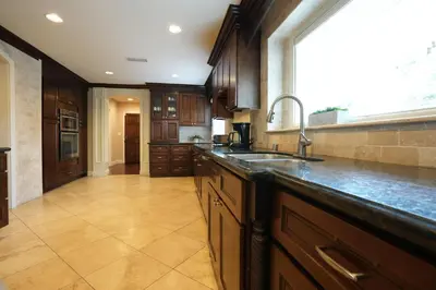 a large kitchen with a sink and a window at Destination #03 in Fullerton
