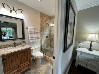 a bathroom with a shower and a toilet and a sink at Destination #05 in Anaheim