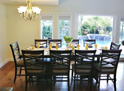 a dining room with a table with chairs and a dining room at Destination #09 in Anaheim