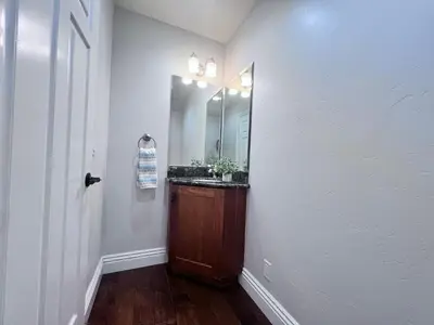 a bathroom with a sink and a mirror at Destination #09 in Anaheim