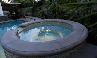 a bath tub in front of a swimming pool at Destination #28 in Anaheim