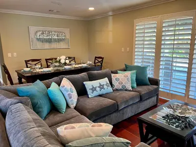 a living room with a couch and a table at Destination #16 in Anaheim