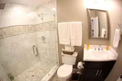 a bathroom with a shower and a toilet and a sink at Destination #32 in Anaheim