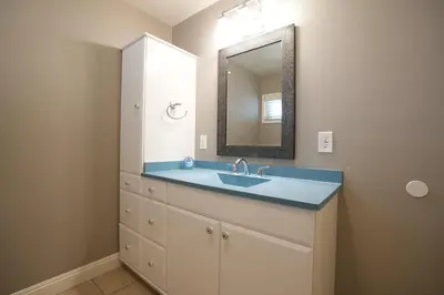 a bathroom with a sink and a mirror at Destination #25 in Anaheim