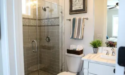 a bathroom with a shower and a toilet and a sink at Destination #34 in Santa Ana