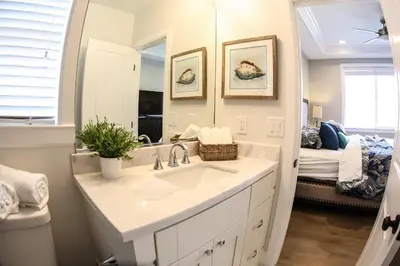a bathroom with a sink and a mirror at Destination #35 in Anaheim