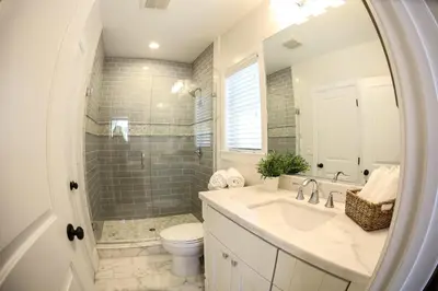 a bathroom with a sink and a toilet and a shower at Destination #35 in Anaheim