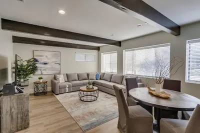 a living room with a couch and a table at Destination #41 in Fullerton
