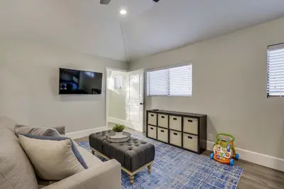 a living room with a couch and a table at Destination #41 in Fullerton