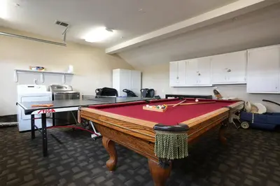 a room with a pool table in a room at Destination #14 in Anaheim