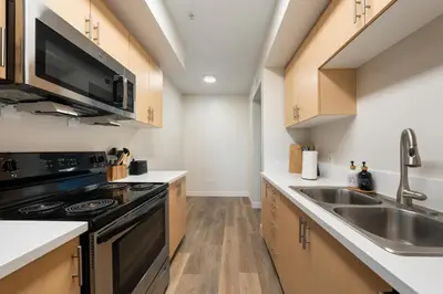 a kitchen with a sink and a stove at The Blossom-Modern 1BR Getaway in Marina Walk to Water&Restaurants in Los Angeles