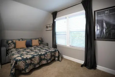 a bedroom with a bed and a window at Destination #51 in Santa Ana