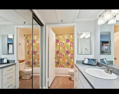 a bathroom with a sink and a toilet and a shower at Hollywood 1Bed Apt w Rooftop pool & Panoramic View in Los Angeles