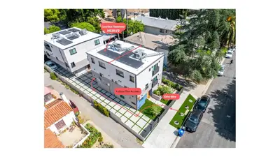 an overhead view of a white building on a street at Luxurious Townhome W/3 Master Suites gated Parking in Los Angeles