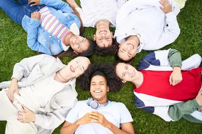 a group of people lying in the grass at Luxurious Townhome W/3 Master Suites gated Parking in Los Angeles