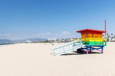 a colorful life guard station on the beach at Luxurious Townhome W/3 Master Suites gated Parking in Los Angeles