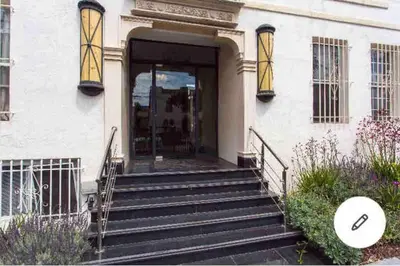a building with stairs leading to a door at Stylish Apartment in Koreatown! Central Location!! in Los Angeles