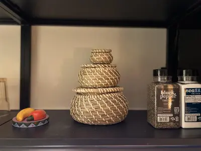 a stack of towels on a counter next to a bottle of alcohol at Chic Retreat by Santa Monica in Los Angeles
