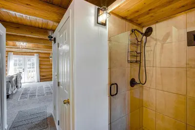 a bathroom with a shower and a walk in shower at Pinon Pines Vacation Rental Hike, Bike and ATV! in Pine Mountain Club