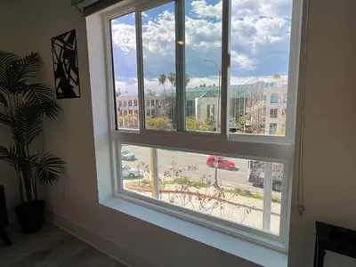 a window in a room with a view of a street at Century City Chic 4 sleep free parking 402 in Los Angeles