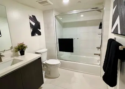 a bathroom with a toilet and a shower and a sink at Century City Chic 4 sleep free parking 402 in Los Angeles