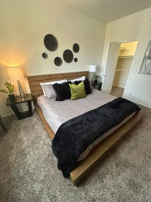 a bedroom with a large bed in a room at Beverly Hills Midle City 1 br Apt with Parking 202 in Los Angeles