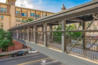 a bridge over a city street with a building at Adorable and Bright 2BD 2BR 740 in Los Angeles