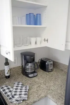 a kitchen counter with a toaster and a coffee maker at LBC Cozy Suite -Downtown! Beach! in Long Beach