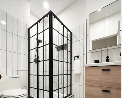 a bathroom with a toilet and a glass shower at New York Style 1bed 1bath West Hollywood in Los Angeles