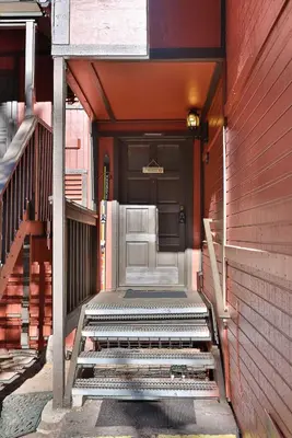 a front door of a house with stairs leading to it at Spa Steps to Lift Private Spa BBQ Massage Chair in Big Bear Lake