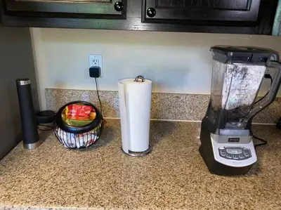 a blender sitting on a counter next to a basket of fruit at Big & Cozy Duplex Home in Los Angeles