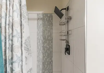 a shower with a shower head in a bathroom at Charming pet friendly family getaway Santa Clarita in Santa Clarita