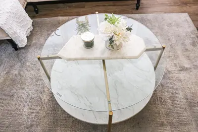 a glass table with flowers on top of it at Luxe Marina Del Rey Apartment,Parking, Gym, Pool, jacuzzi,BBQ in Los Angeles