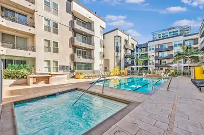 an image of a swimming pool at a apartment complex at Luxury ApartStudio Marina Del Rey Pool, Gym, Parking, Jacuzzi, BBQ in Los Angeles